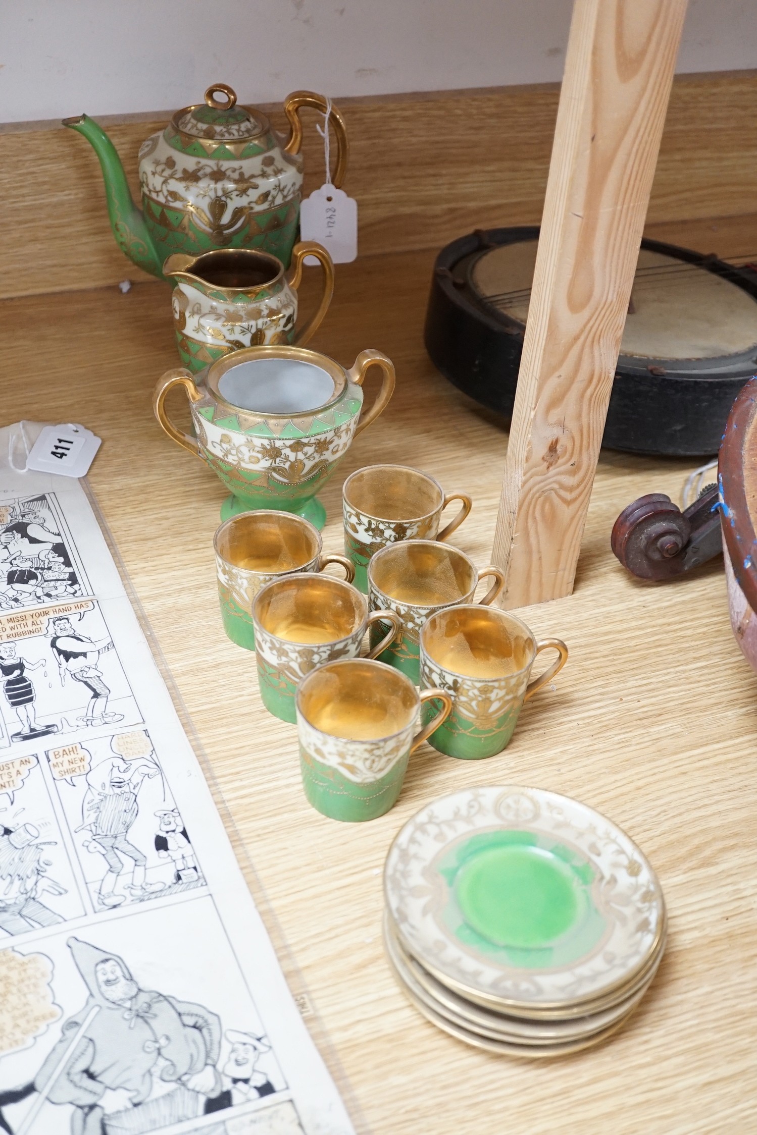 A Japanese export gilt and green coffee set